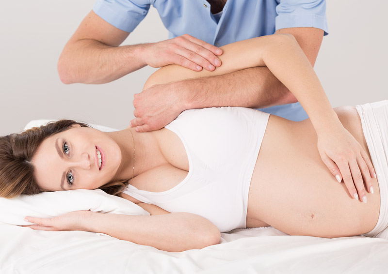 Pregnant Woman Bluestone Chiroprator